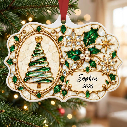 Scalloped ceramic ornament with emerald swirl tree, gold filigree, pearl accents, and a name-and-year cartouche.