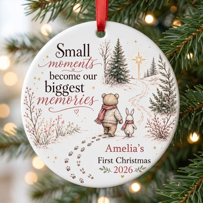Round ceramic ornament with bear and bunny in scarves on snowy path, trees, star, quote, and personalized name and year.