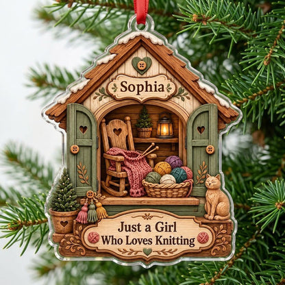 House-shaped acrylic ornament with cozy knitting shed scene and 'Just a Girl Who Loves Knitting' text.