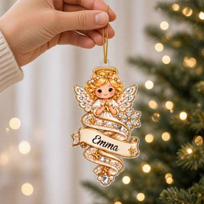 A custom-cut clear acrylic ornament shows a polar bear and Mrs. Claus in a jeweled spiral with a name banner and red rib