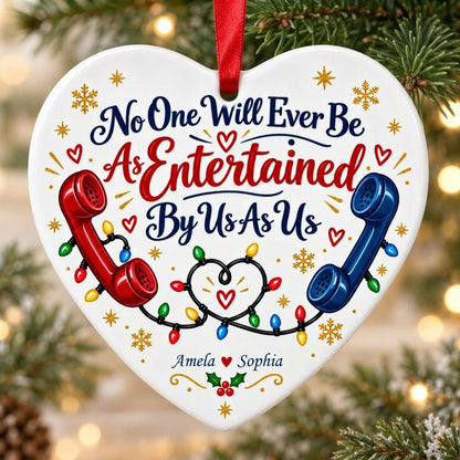 Heart ceramic ornament with red and blue vintage phones, heart-shaped Christmas lights, gold snowflakes and holly.