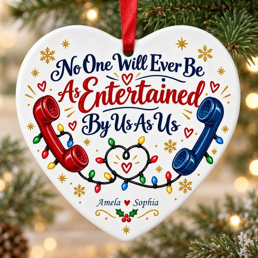 Heart ceramic ornament with red and blue vintage phones, heart-shaped Christmas lights, gold snowflakes and holly.