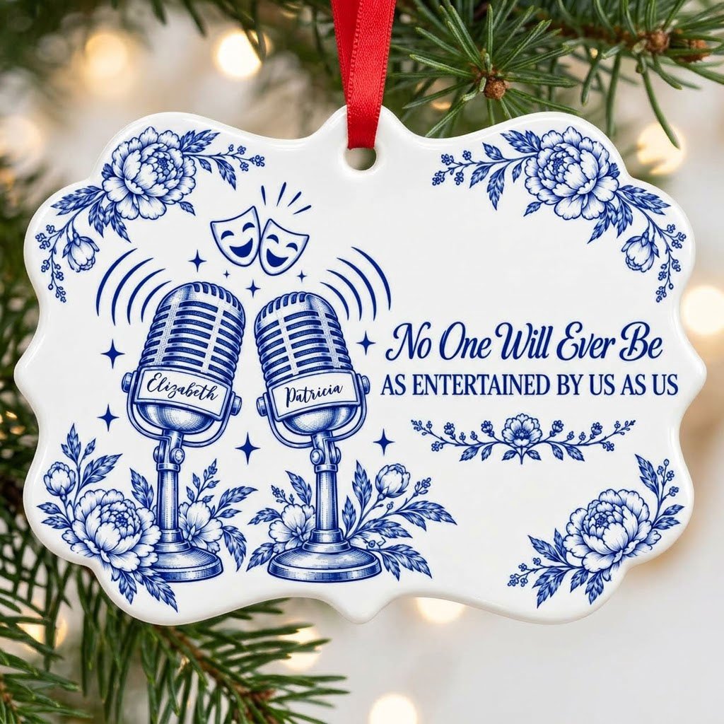 White ceramic ornament with cobalt blue vintage microphones, comedy and tragedy masks, stars and florals with two names.