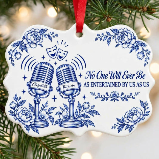 White ceramic ornament with cobalt blue vintage microphones, comedy and tragedy masks, stars and florals with two names.
