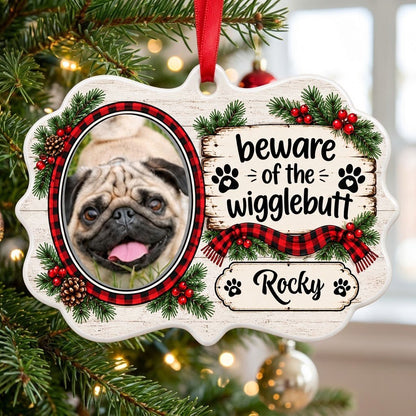 Medallion ornament with buffalo plaid dog photo frame, evergreens, and 'beware of the wigglebutt' text