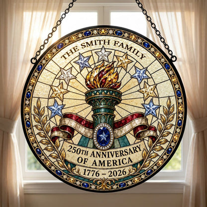 Round stained-glass suncatcher with Statue of Liberty torch, stars, ribbon, laurel, and 250th Anniversary text.