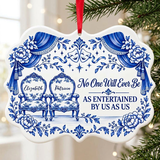 Blue-and-white ceramic ornament with theater masks, vintage chairs, Delft florals, and draped curtains.