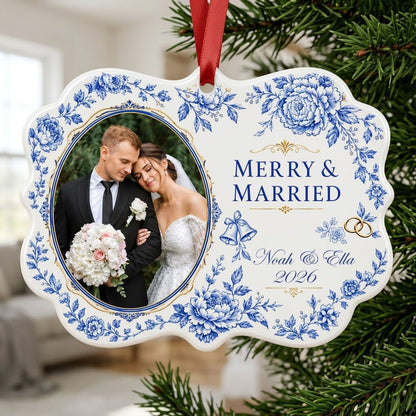 Scalloped ceramic ornament with blue floral border, 'MERRY & MARRIED', gold rings and bells, and a couple photo frame.