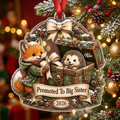 Custom-cut acrylic ornament: fox in jacket, hedgehog in box, pine arch and Promoted To Big Sister banner.