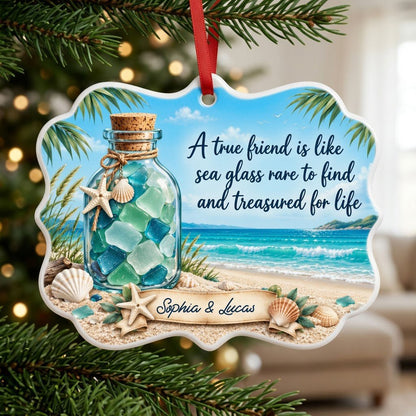 Ornate medallion ceramic ornament with sea glass jar, beach scene, palm branches and a friendship quote for two names.