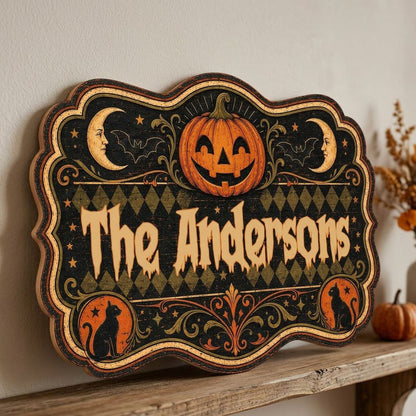 Ornate scalloped wooden sign with jack-o'-lantern, moons, bats, black cats and family name in Halloween style.