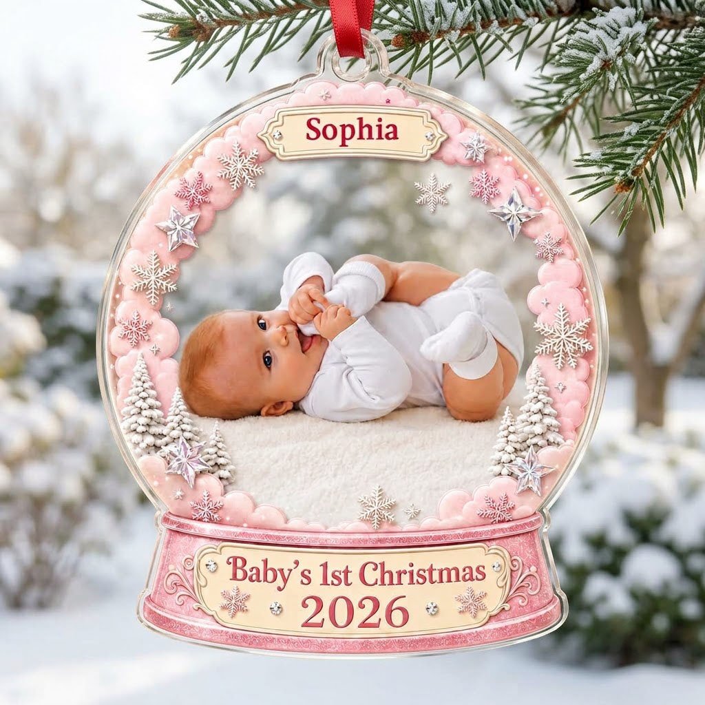 Pink snow globe acrylic ornament with "Baby's 1st Christmas", name banner, year base, and baby photo frame