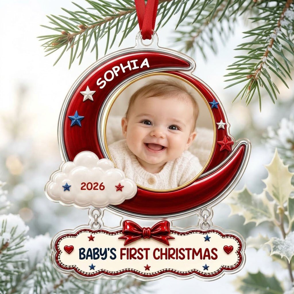 Red crescent moon acrylic ornament with baby photo, cloud, stars, and a plaque reading Baby's First Christmas.