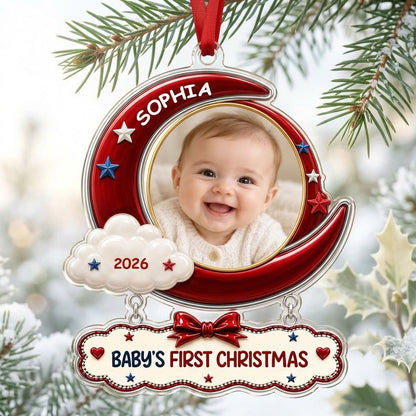 Red crescent moon acrylic ornament with baby photo, cloud, stars, and a plaque reading Baby's First Christmas.