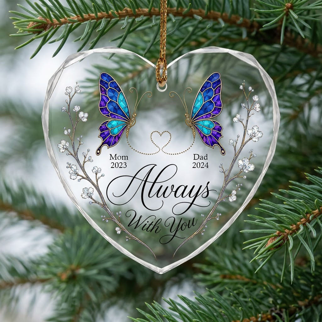 Heart-shaped glass ornament with stained-glass butterflies, gold dotted heart, and white-flower vines.