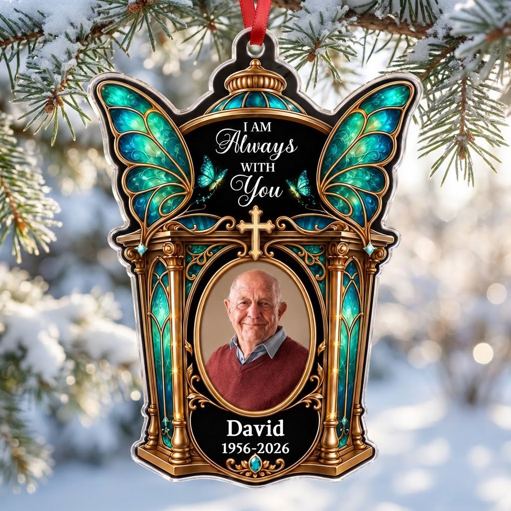 Clear acrylic ornament with winged shrine, teal butterfly wings, cross, oval photo, and 'I AM Always WITH You'.
