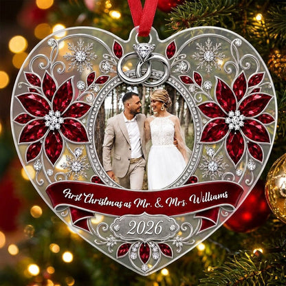 Heart acrylic ornament with couple photo, silver rings, poinsettias, and First Christmas as Mr. & Mrs. 2026.
