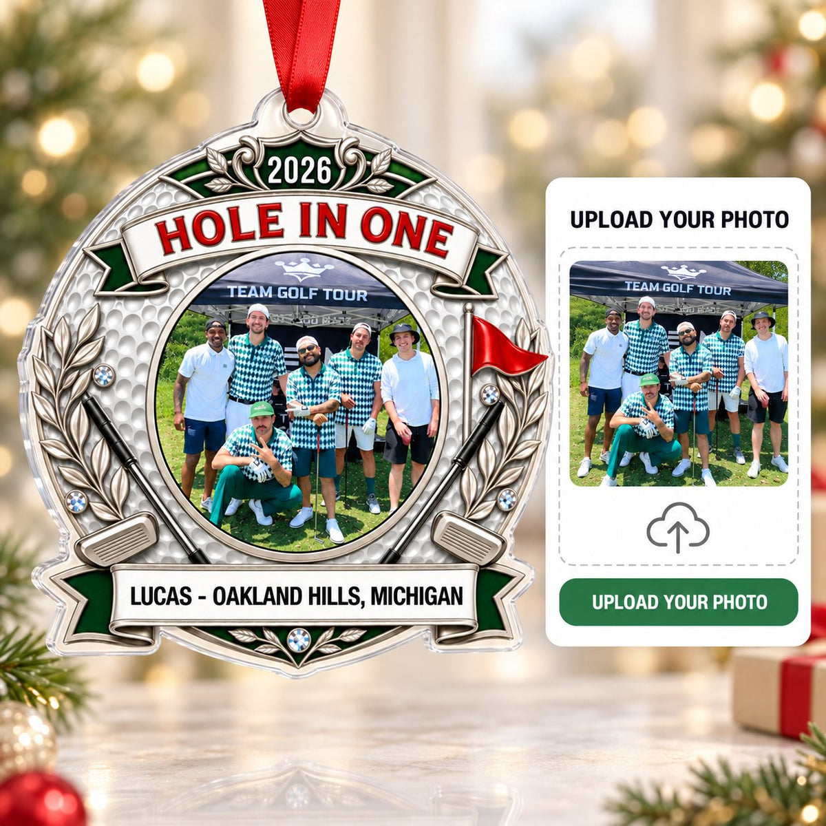 Silver trophy-style golf ornament with laurel branches, crossed clubs, red flag, 2026 and HOLE IN ONE, plus a circular p