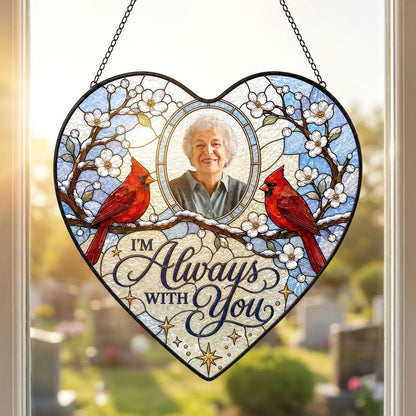 Heart suncatcher with two red cardinals on snowy branches, round photo window, and the words I'M Always WITH You.
