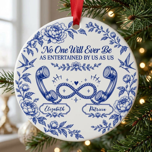 Blue toile round ornament with crown, swallows, vintage phones in an infinity and two name banners