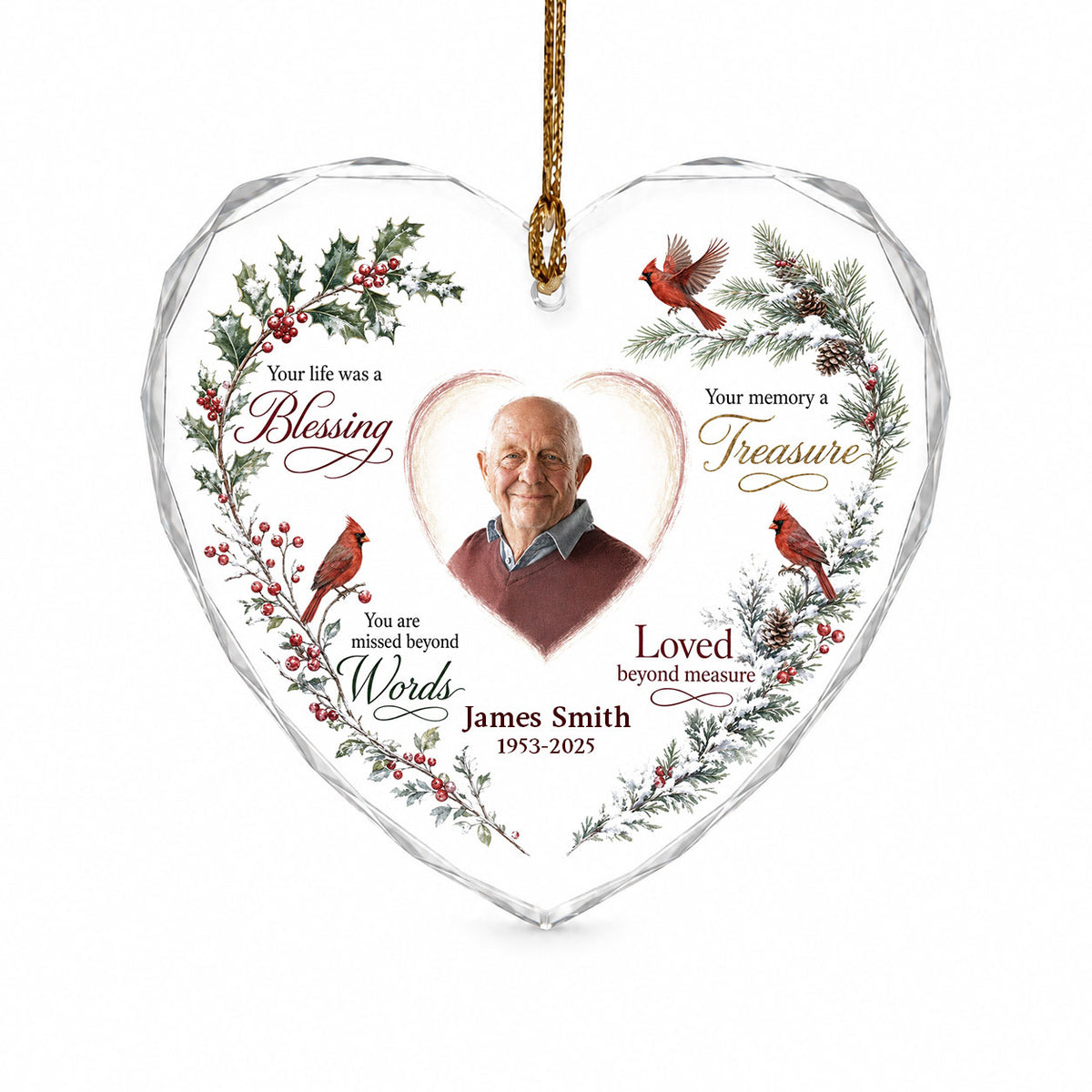 Heart glass ornament with a photo, red cardinals, and a winter wreath of pine, holly, berries, and pinecones.