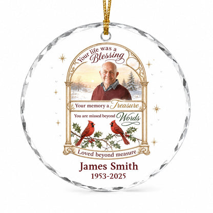 Round glass ornament with golden arched photo frame, two red cardinals on snowy pine and a memorial quote.