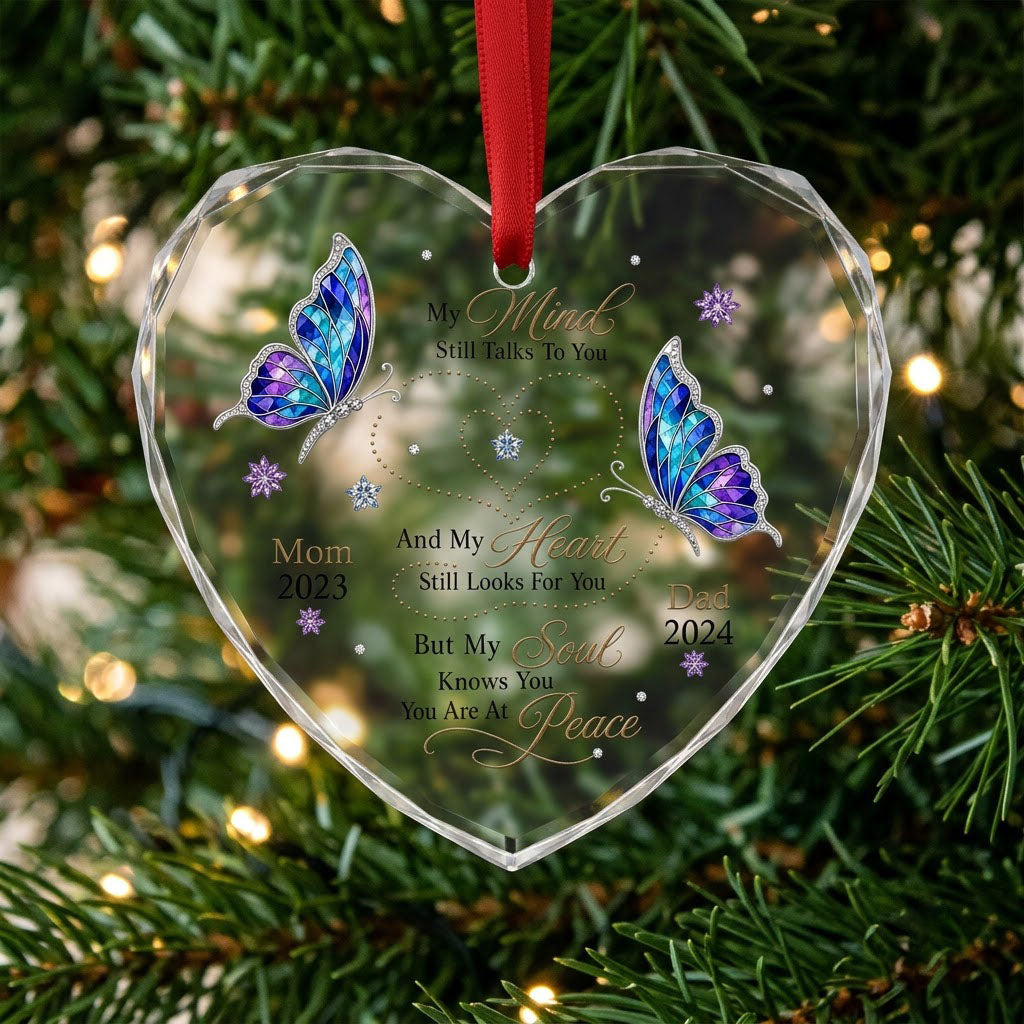 Heart glass ornament with two stained-glass butterflies, dotted heart trails, snowflakes, and a memorial quote.