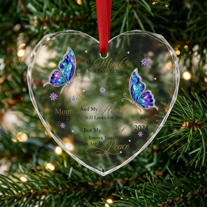 Heart glass ornament with two stained-glass butterflies, dotted heart trails, snowflakes, and a memorial quote.