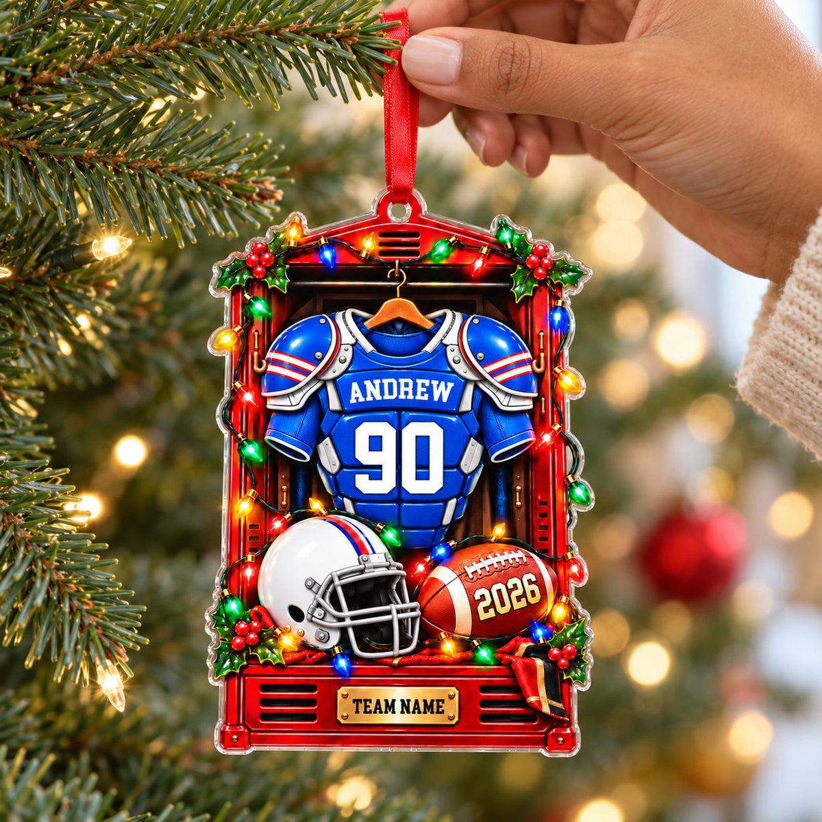 Acrylic ornament shaped like a red football locker with lights, jersey, helmet, football and gold nameplate.