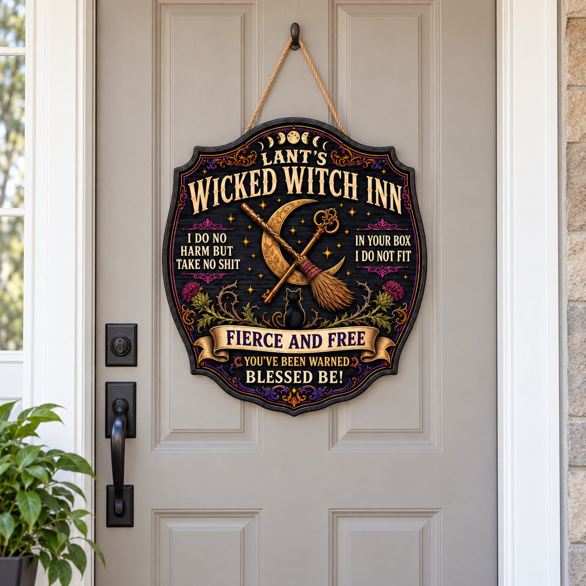 Ornate wooden plaque with moon phases, crescent moon, broomstick, key, black cat, thistles and witchy quotes.