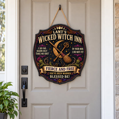 Ornate wooden plaque with moon phases, crescent moon, broomstick, key, black cat, thistles and witchy quotes.