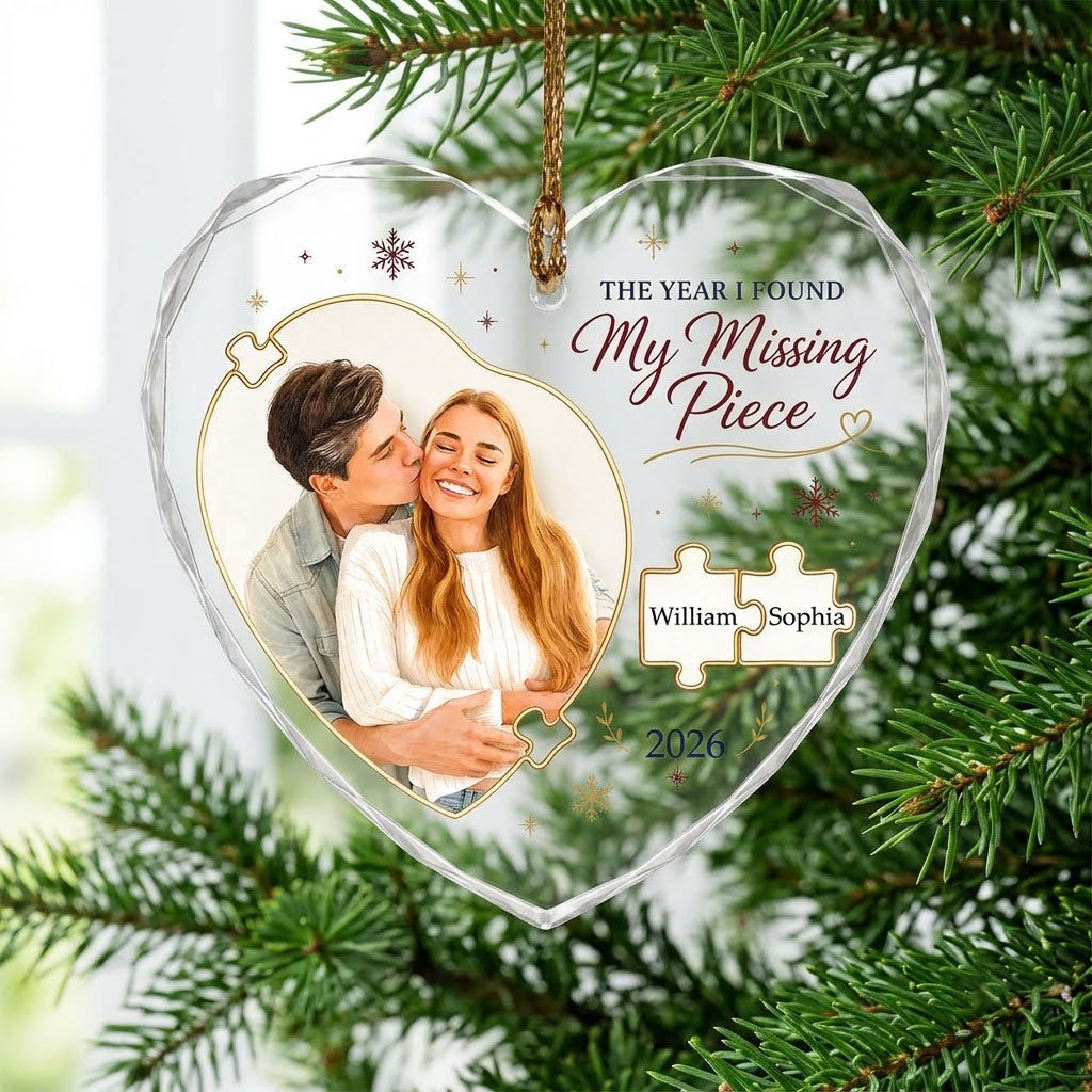 Heart glass ornament with gold puzzle pieces, couple photo, snowflakes, reading THE YEAR I FOUND My Missing Piece.