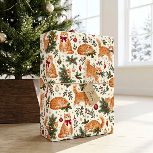 Cream gift wrap with ginger tabby cats, red and gold ornaments, pine boughs, berries and stars in a pattern.