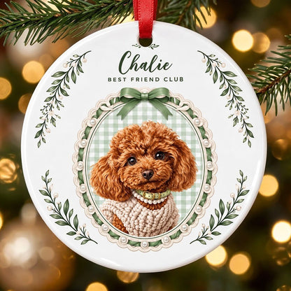 Round ceramic ornament with a poodle portrait, 'BEST FRIEND CLUB', green gingham, bow, and leafy sprigs.