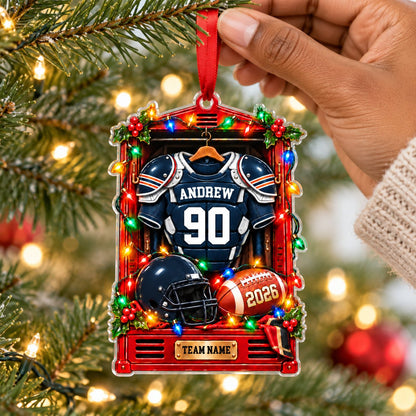 A red sports locker ornament with a football jersey, helmet, ball, holly, and Christmas lights on a custom-cut acrylic s