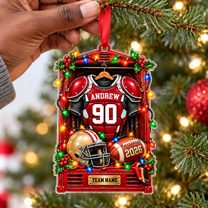 Acrylic ornament with a red football locker, jersey on hanger, gold helmet, brown football and gold plaque