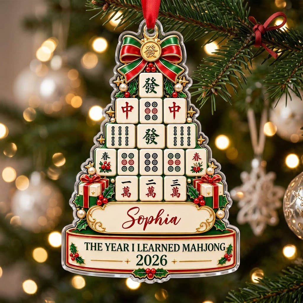 Acrylic tree ornament of mahjong tiles with bow, stars, holly, pearls, and two cream banners for name and year.