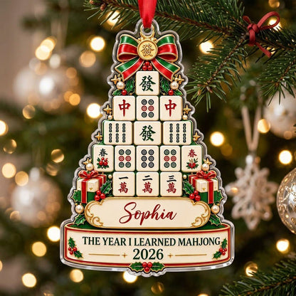 Acrylic tree ornament of mahjong tiles with bow, stars, holly, pearls, and two cream banners for name and year.
