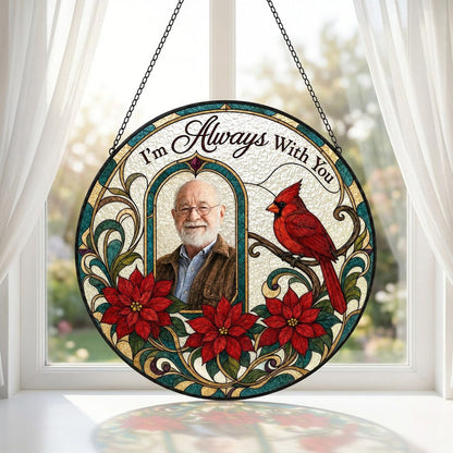 Round stained-glass style suncatcher with arched photo window, red cardinal, three red poinsettias and the words I'm Alw