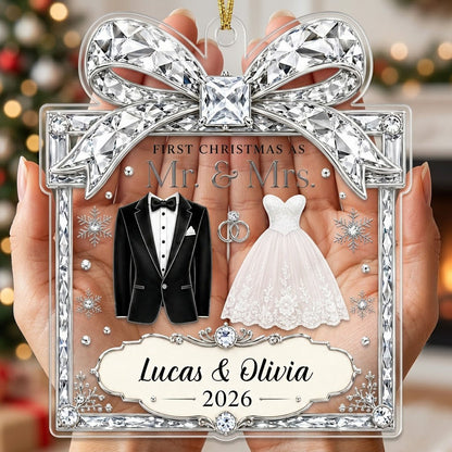 Clear acrylic gift-box ornament with jeweled bow, tuxedo jacket, wedding gown, silver rings and a silver banner.