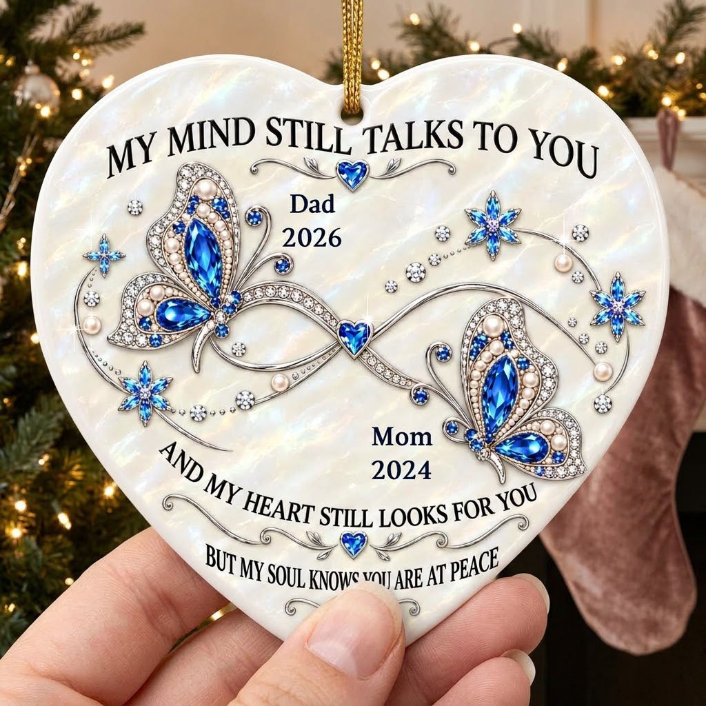 Heart ceramic ornament with blue jeweled butterflies, a silver infinity, and quote 'My Mind Still Talks To You'.