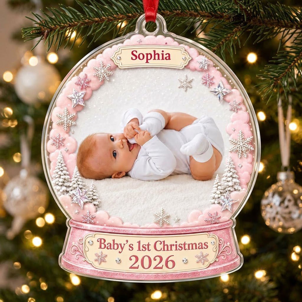 Pink snow globe acrylic ornament with "Baby's 1st Christmas", name banner, year base, and baby photo frame