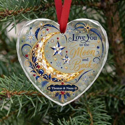 Heart glass ornament with jeweled gold crescent moon, blue hanging stars, and 'Love You to the Moon and Back' text.