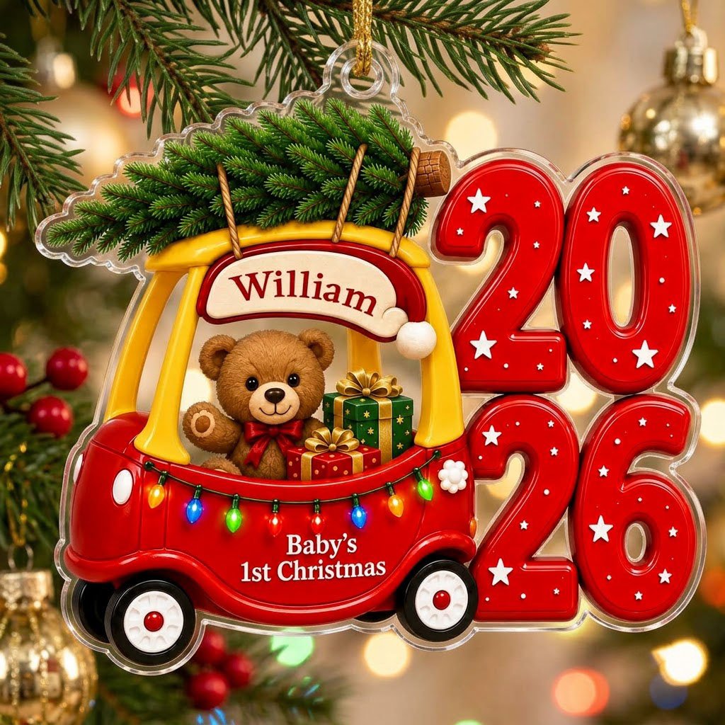 Red toy car with pine tree, teddy bear and gifts, "Baby's 1st Christmas" and 2026 star-pattern numbers on clear acrylic.