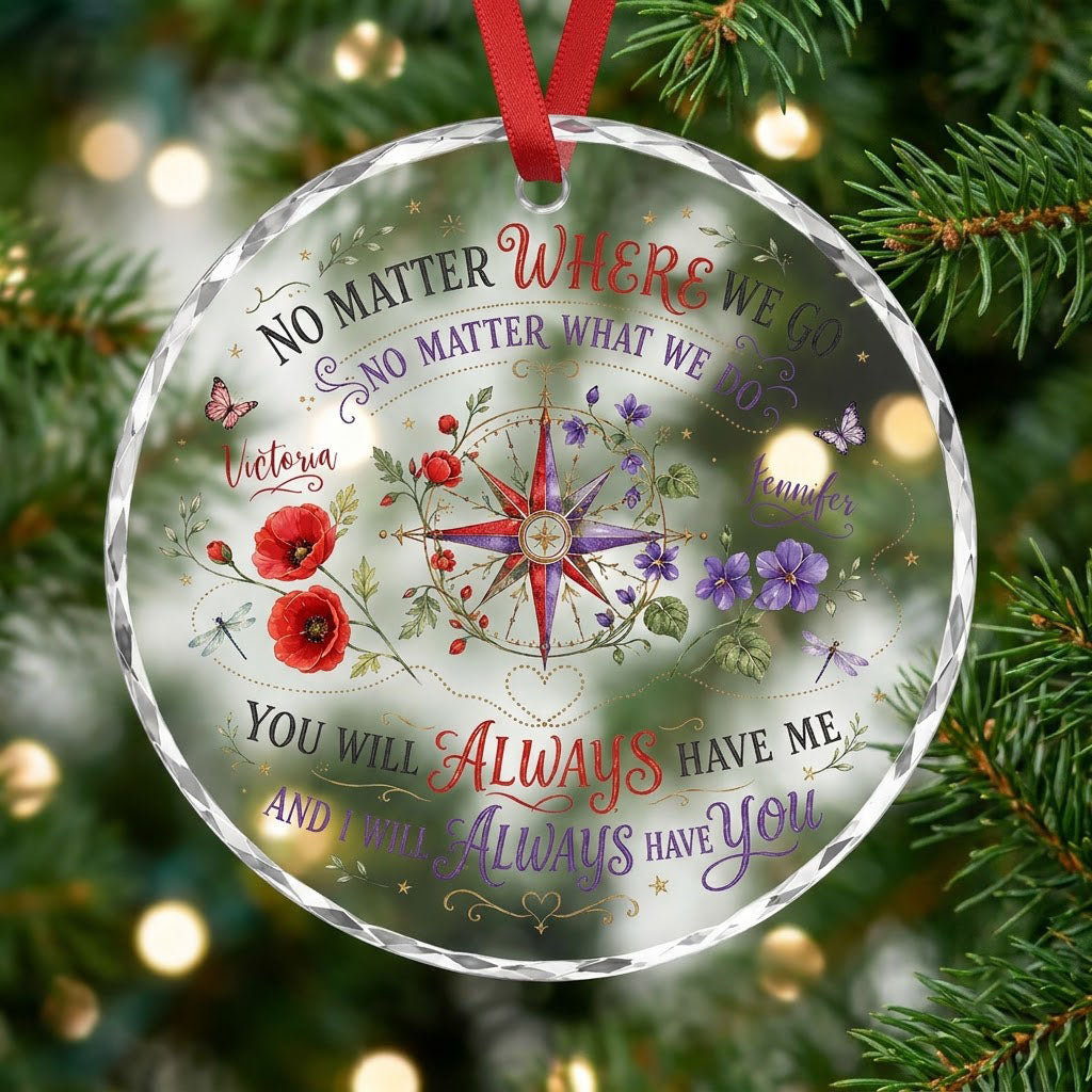 Round glass ornament with a compass rose, red and purple flowers, butterflies, dragonflies, and long-distance quotes.
