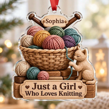 Acrylic ornament shaped around a yarn basket, cat and needles with 'Just a Girl Who Loves Knitting' and a name banner.