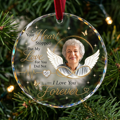 Round ornament with angel wings, photo circle, infinity symbol, heartbeat line to heart, and butterflies.