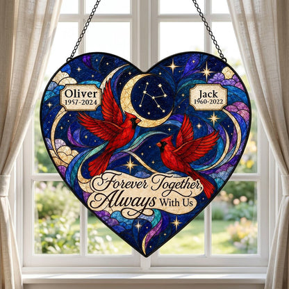 Heart stained glass suncatcher with two red cardinals, crescent moon, stars, clouds, and memorial name banners.