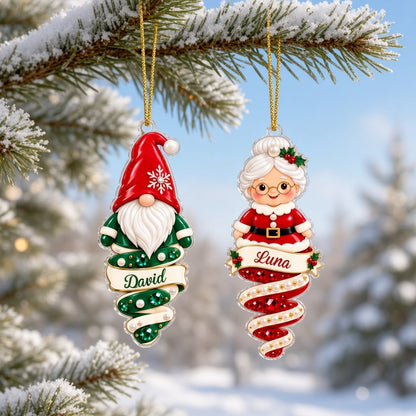 Custom-cut acrylic ornament with polar bear or Mrs. Claus atop a jeweled spiral ribbon and a name scroll banner.
