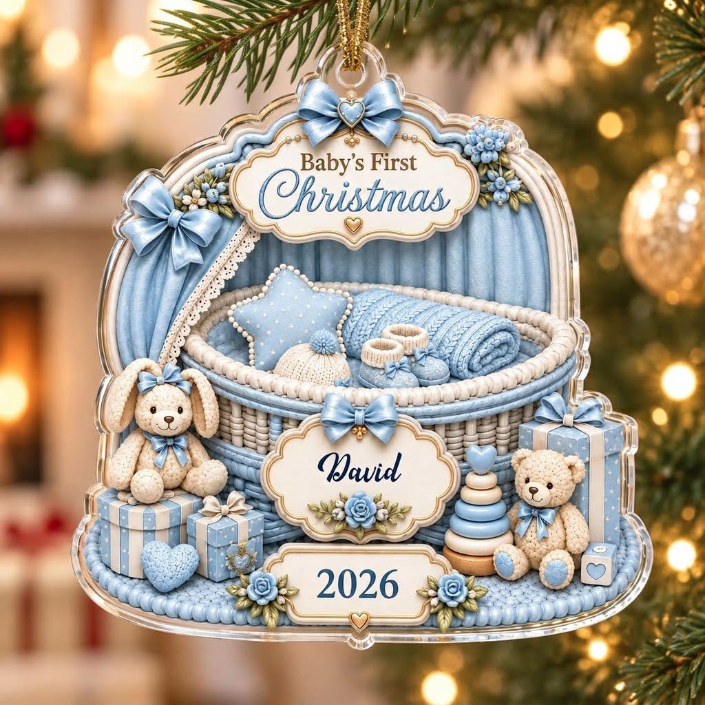 Clear acrylic ornament with blue nursery bassinet, bunny, teddy, and Baby's First Christmas with name and year.